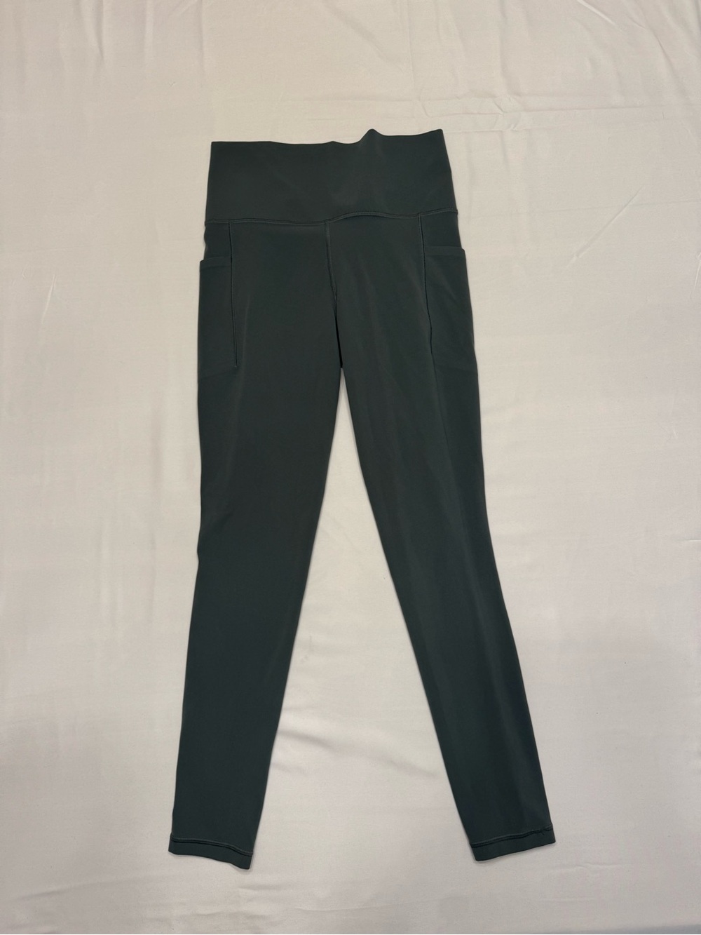 Athleta Dark Green High-Rise Leggings with Side Pockets